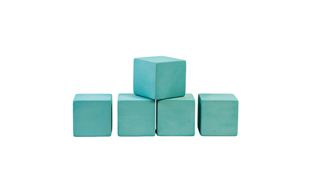 Isolated arrangement of five teal blue wooden toy blocks stacked in a playful pyramid shape