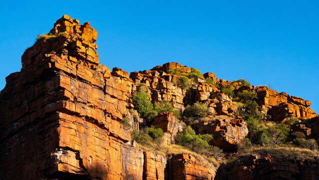 Kimberley coast australia orange cliffs ancient iron sandstone monuments tectonic old impressive black unique geology