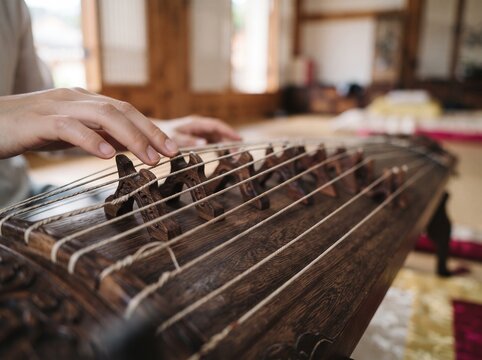 Playing Korean gayageum
