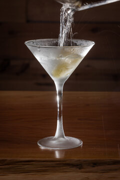 Elegant cocktail in a martini glass. The classic Vesper Martini, stylized background adds moody sophistication. Ideal for upscale bar or cocktail menus