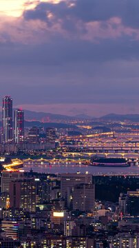 Vertical Time lapse ,Aerial view of Seoul city and Han river and sunset Sky