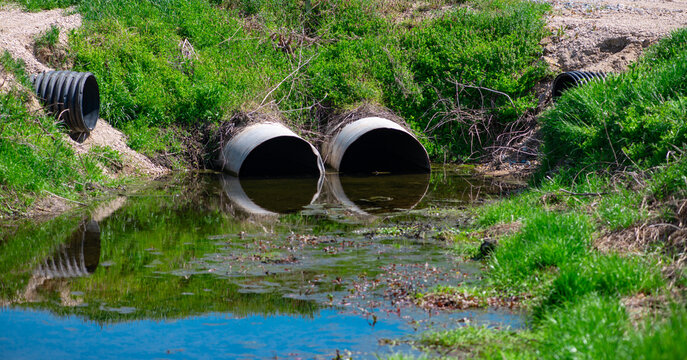 Drainage flow protects wetland from erosion. Drainage system moves water through culvert. Sustainable runoff needs drainage near creek. Flood control depends on drainage capacity.