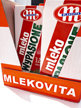 WARSAW, POLAND - MAY 7, 2026: Mlekovita Wypasione milk cartons in display tray