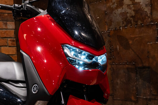 Red Yamaha NMAX Scooter Front Headlight Close Up Detail