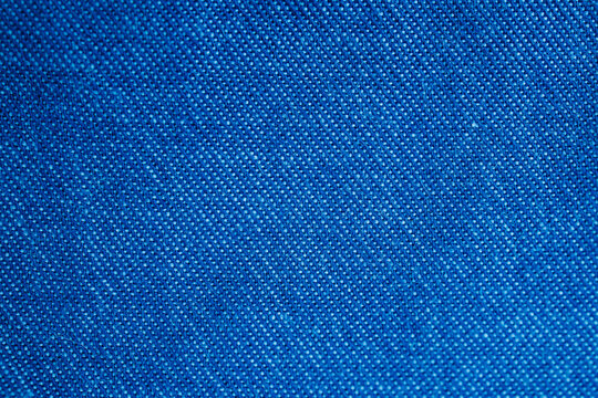 Blue woven fabric texture with diagonal twill weave