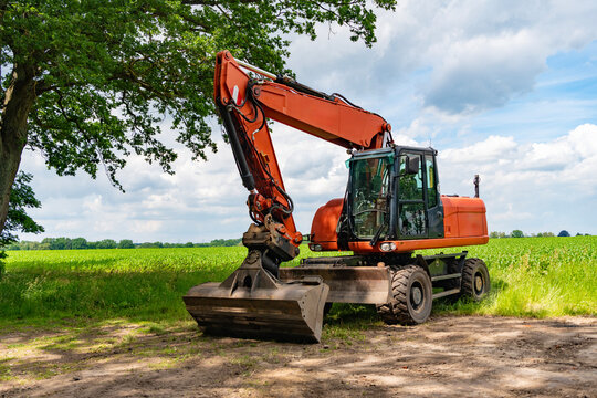 Heavy industrial machines. Excavator. Heavy equipment of excavator with hydraulic system. Excavator heavy machinery. Industrial heavy equipment. Excavator machinery in field