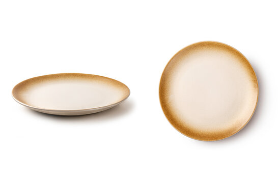 Side and Top View of Round Beige Ceramic Plate with Brown Rim isolated on white background.