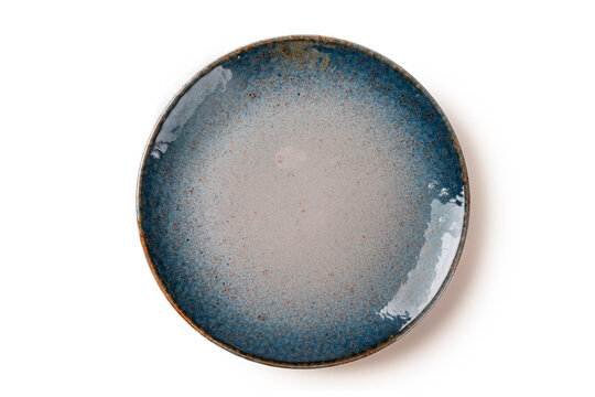 Empty Blue Ceramic Plate with Speckled Texture Isolated on White background.