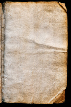 Aged vintage book with yellowed pages and worn edges resting on dark surface