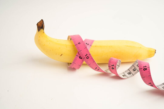 Banana with measuring tape, penis health.