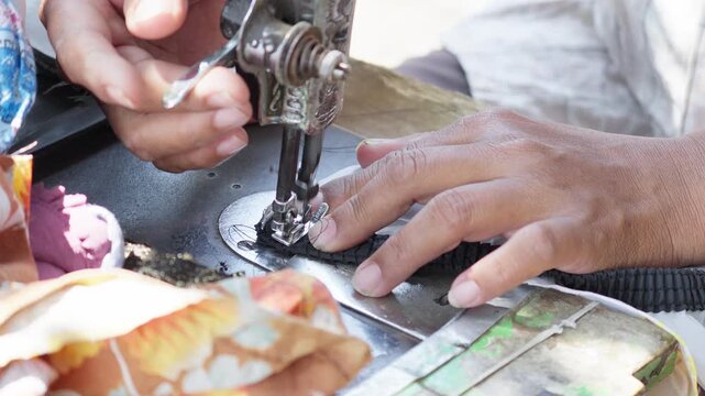 Fabric Being Sewn With Traditional Sewing Machine
