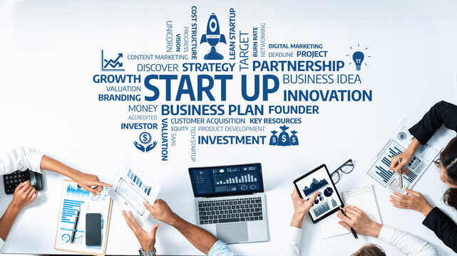 A modern office scene showcasing diverse professionals collaborating on a startup project, surrounded by charts and keywords reflecting business strategies and innovation efforts. Amity