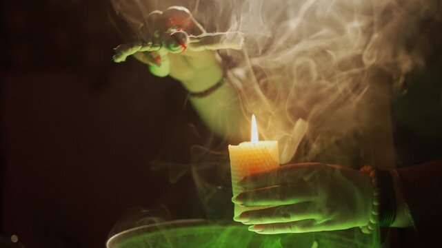 A realistic witch brewing a potion. She waves a voodoo doll over a burning candle and chants a spell. Everyday life intertwined with traditional witchcraft. Magic and a mystical atmosphere