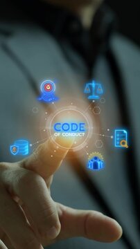 Businessman finger touching glowing code of conduct hub vertical shot with corporate ethics icons. Business compliance governance policy, moral integrity standards, and accountability idea concept.