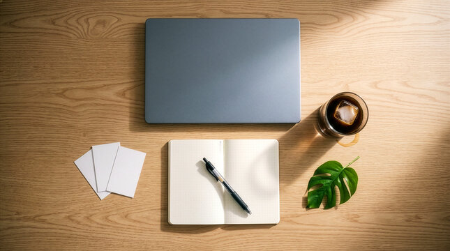 Flat Lay Workspace with Laptop, Notebook, Coffee and Plant