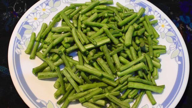 prepared green yardlong beans or boro vegetable for sabji