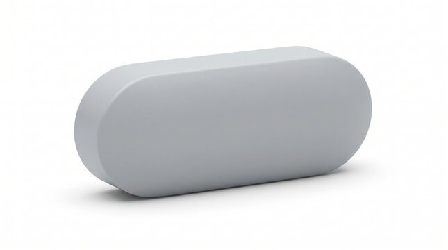 Single grey oblong medical pill on a flat surface