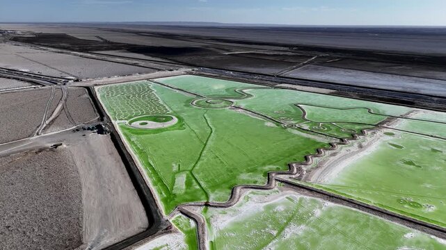 aerial view of green energy storage station salt pools