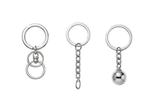 three metal keychains with different types of chain attachments isolated on transparent background