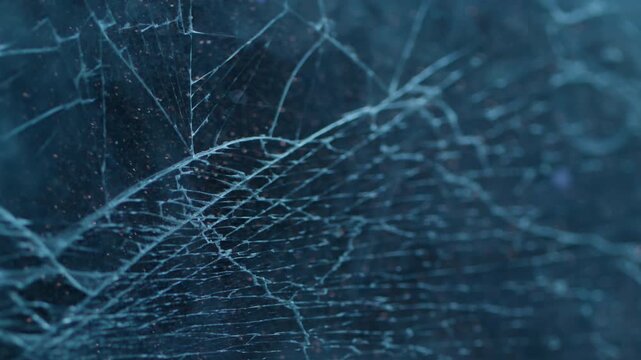 Steam haze. Broken window. Defocused blue color smoke vapor cold fragile texture smog mist scratched glass on abstract art uneven background.