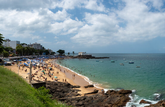 Porto da Barra Beach in Salvador, featuring calm seas, clear waters, and a historic setting that highlights coastal beauty, the tropical climate, and Bahian charm.