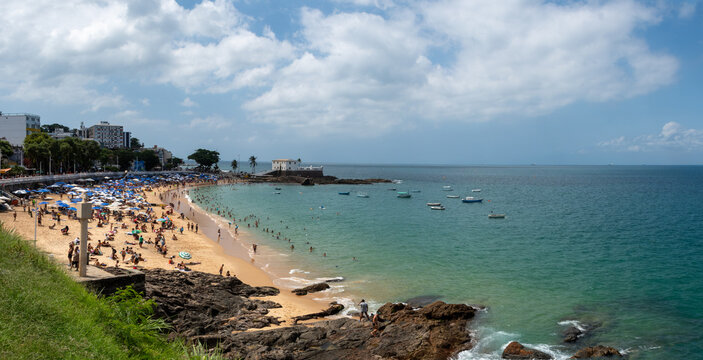Porto da Barra Beach in Salvador, featuring calm seas, clear waters, and a historic setting that highlights coastal beauty, the tropical climate, and Bahian charm.