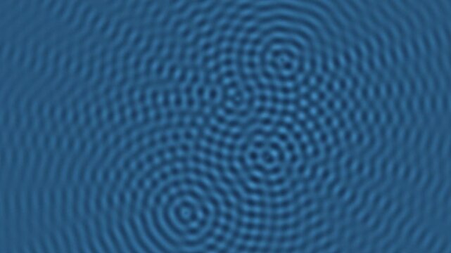 Concentric blue ripples expanding and interfering across a calm water surface. Seamless abstract loop for nature, wellness and ambient visuals.