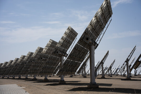 Large scale thermal power station solar collector array under blue sky