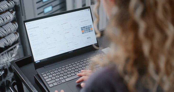 Female Professional Investigates Cyber Attack Alert Through Linux CLI, Monitoring Server Status and Entering Emergency Commands During Active Cybersecurity Incident Response Inside Facility.