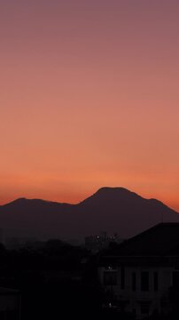 Vertical video - Timelapse of colorful sky gradient at dawn before sunrise