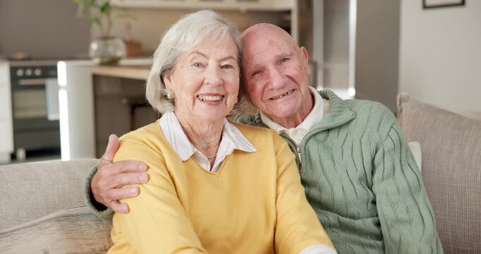 Senior, face and relax with couple on sofa for retirement, pension or old age home together. Portrait, elderly man and woman with smile, hug or love for holiday comfort or weekend break in house