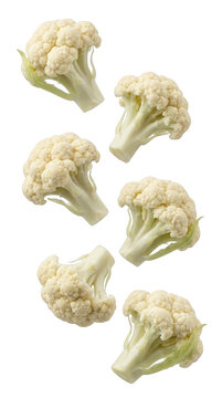 Fresh raw cauliflower florets falling isolated on transparent background