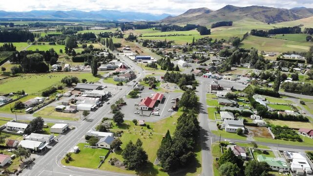 Lumsden aerial townscape with historic railway station and scenic Southland countryside, New Zealand