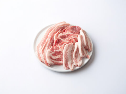 Pork of various cuts on a plate