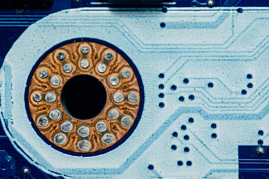 Circuit board close up showing intricate solder joints