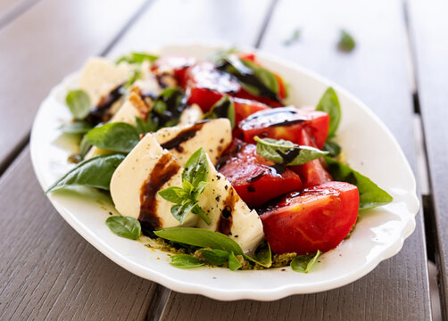 Healthy Mediterranean Salad with Mozzarella and Fresh Basil