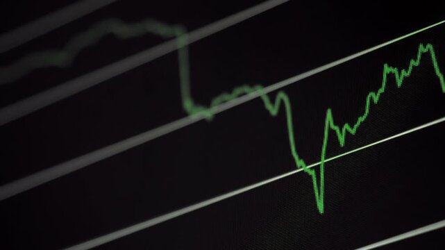 Green cryptocurrency price line dives on a dark trading chart then rebounds into a rising jagged trend across angled market grid lines