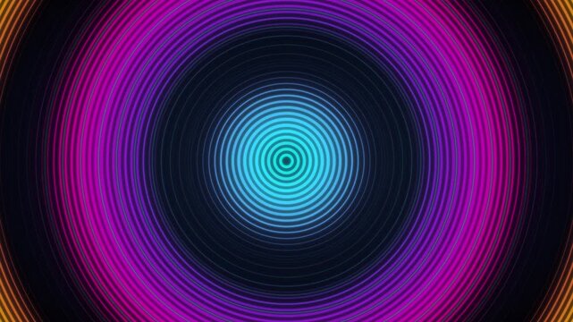 Hypnotic colorful circular rings expanding on dark background
