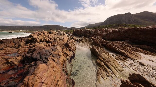 ultra wide angle view of Kammabaai Beach, Hermanus, South Africa