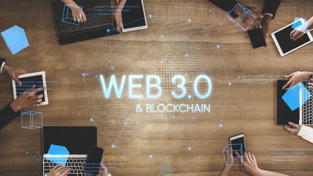 Collaborative Work Environment Highlighting Web 3.0 and Blockchain Technology with Laptops and Tablets on Wooden Table. Entropy.
