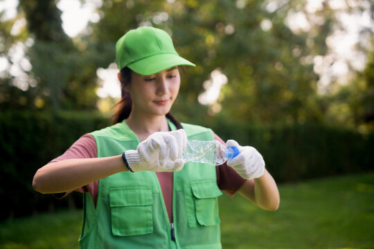 Volunteer woman keep plastic bottle&nbsp;garbage for recycling concept reuse Ecology and environment