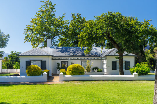 Winery house surrounded by lush greenery