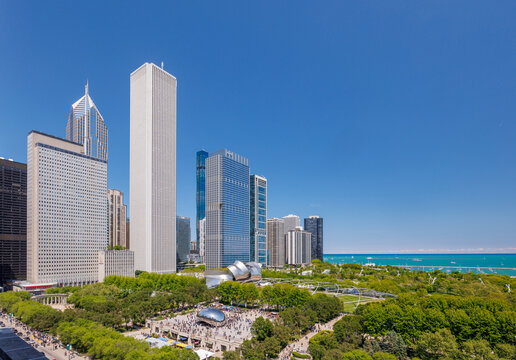 Vibrant sunny view of Chicago downtown skyline under a blue sky