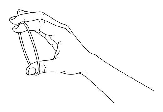 A hand holds a stretched rubber band, elastic object.
