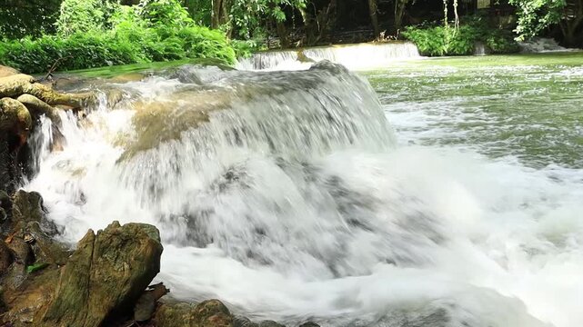 Beautiful waterfall amidst the forest 
 Chet Sao Noi Waterfall,  Namtok Chet Sao Noi National Park
