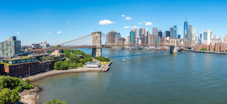New York City, viewed from the pedestrian walkway of the Manhattan Bridge looking toward Brooklyn Bridge Park and the Financial District.