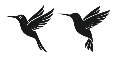 Fototapeta premium Set of two hummingbird silhouettes in flight