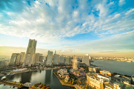Panoramic aerial view of yokohama landmark tower and minato mirai city skyline, cityscape during golden hour sunset