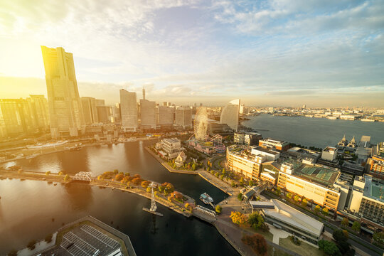 Panoramic aerial view of yokohama landmark tower and minato mirai city skyline, cityscape during golden hour sunset