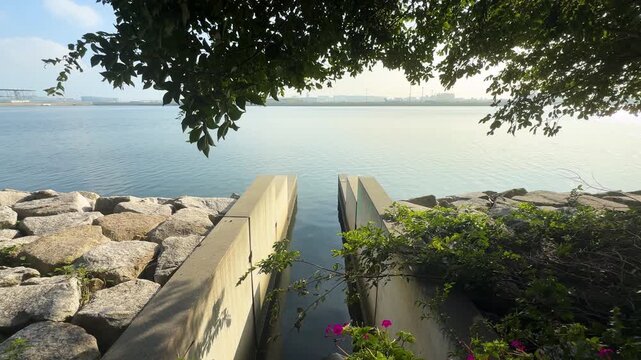 Stormwater Outfall and Coastal Drainage Channel Viewed from Keihinjima Greenway in Tokyo